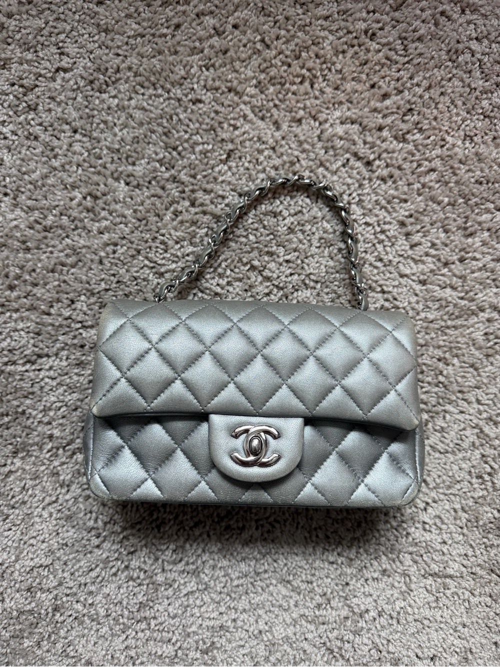 CHANEL Quilted Mini Flap Bag in Metallic Silver